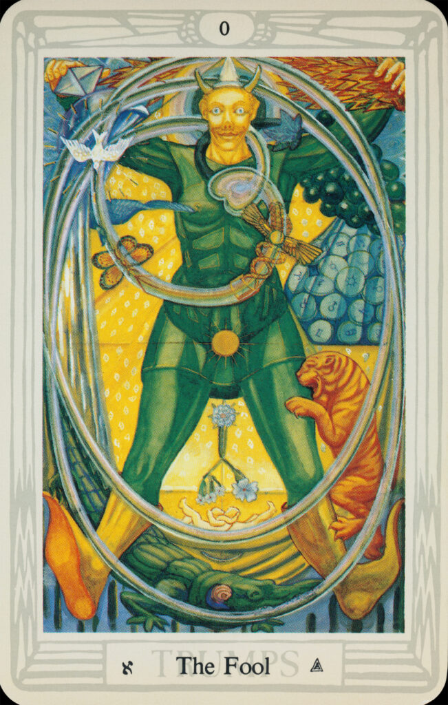 Glasgow, UK - July 6, 2011: Trump card number 0 from Aleister Crowley's Thoth Tarot card deck - The Fool. Crowley designed the cards which were then painted by Lady Frieda Harris between 1938 and 1943 but not published until 1969. In Crowley's explanation, this card signifies true innocence.